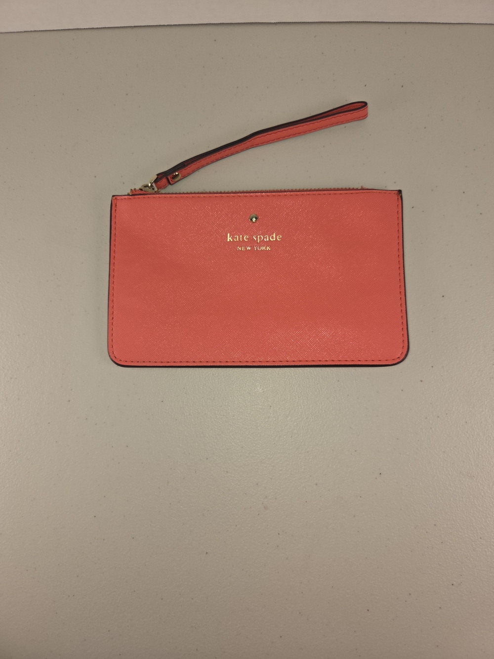 kate spade Coral Saffiano Wristlet Like New with Gold Logo
